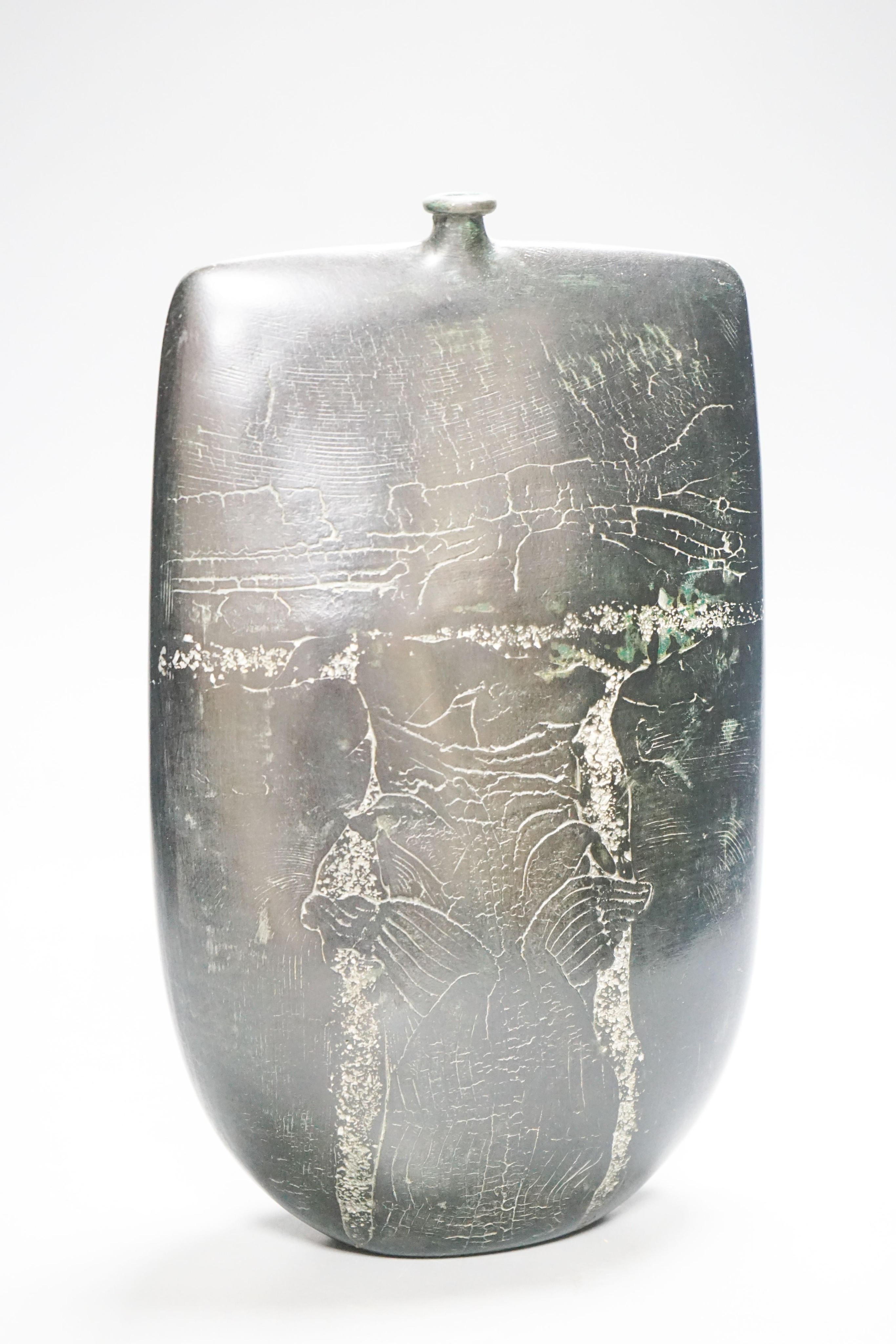 Peter Hayes (b.1946), a black raku glaze Bow form bottle, 29cm